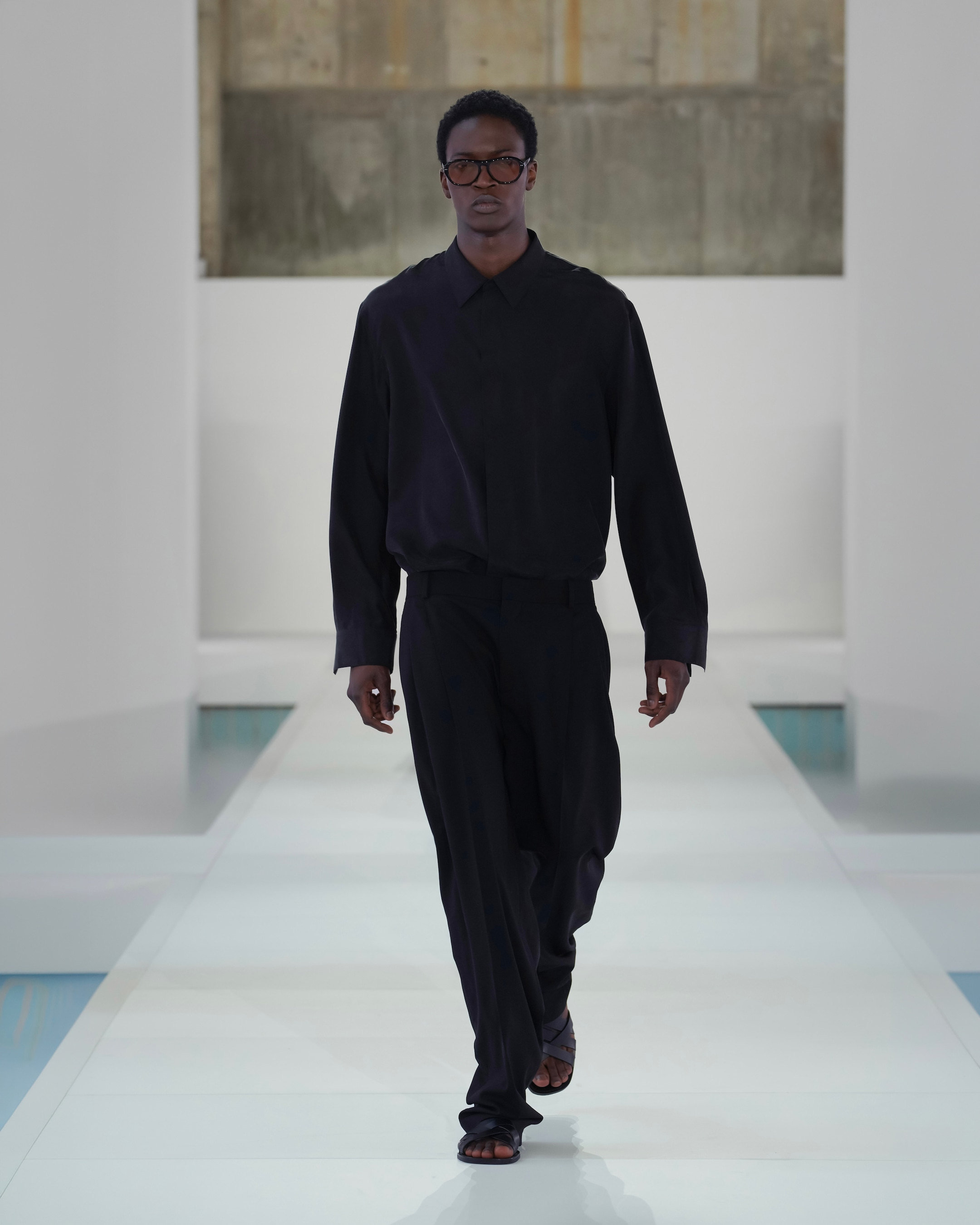 Black silk shirt and black trousers