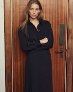 Placeholder for: woman in matching brown shirt and brown skirt