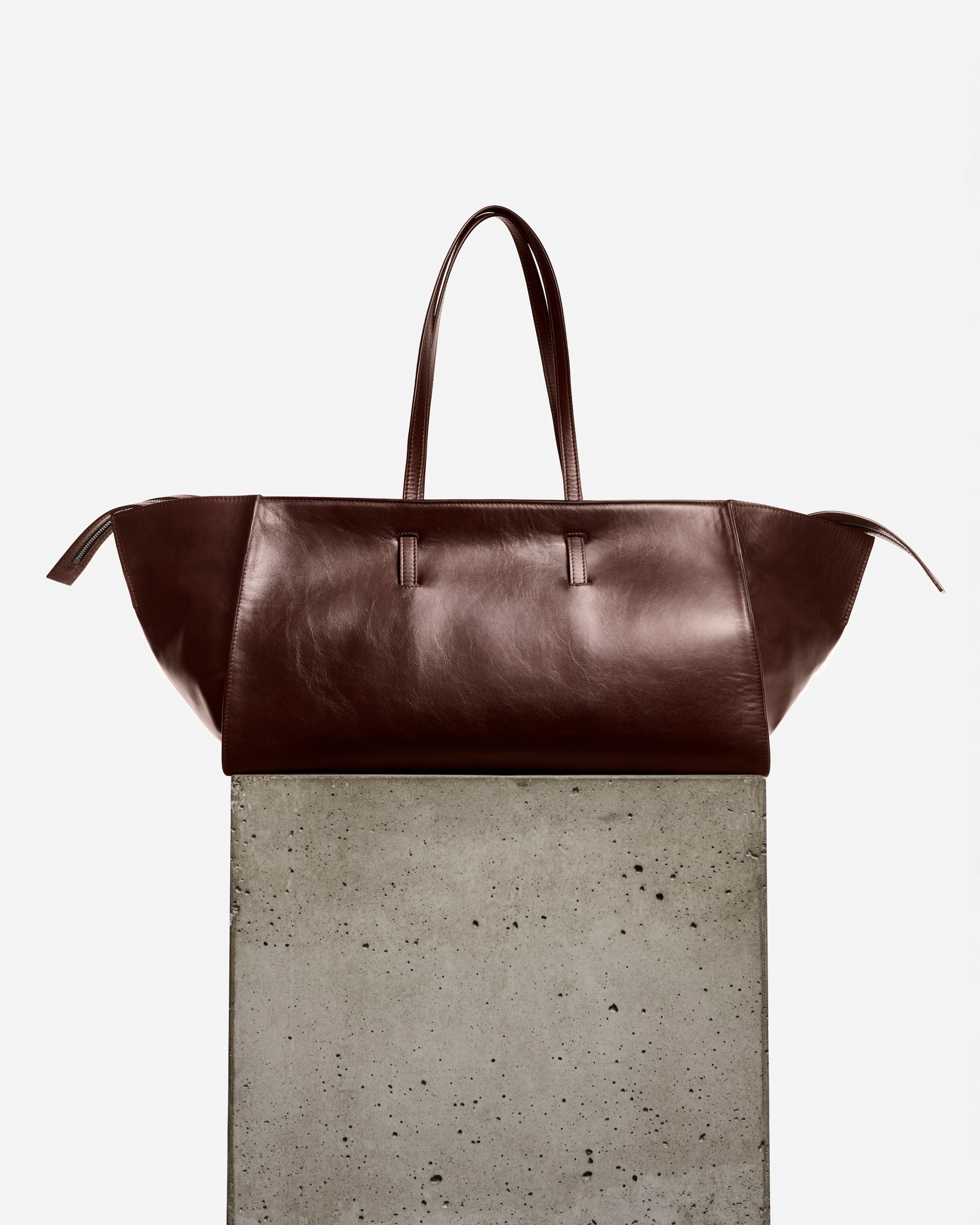 leather bag on plinth