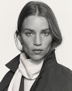 Placeholder for: Face of woman wearing white shirt