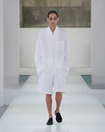 Placeholder for: white zip shirt and shorts