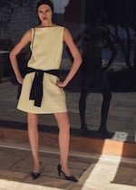 Placeholder for: woman in yellow dress
