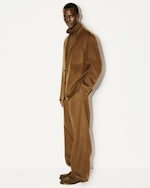 Placeholder for: Man in tan suit