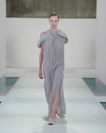 Placeholder for: woman in pleated dress