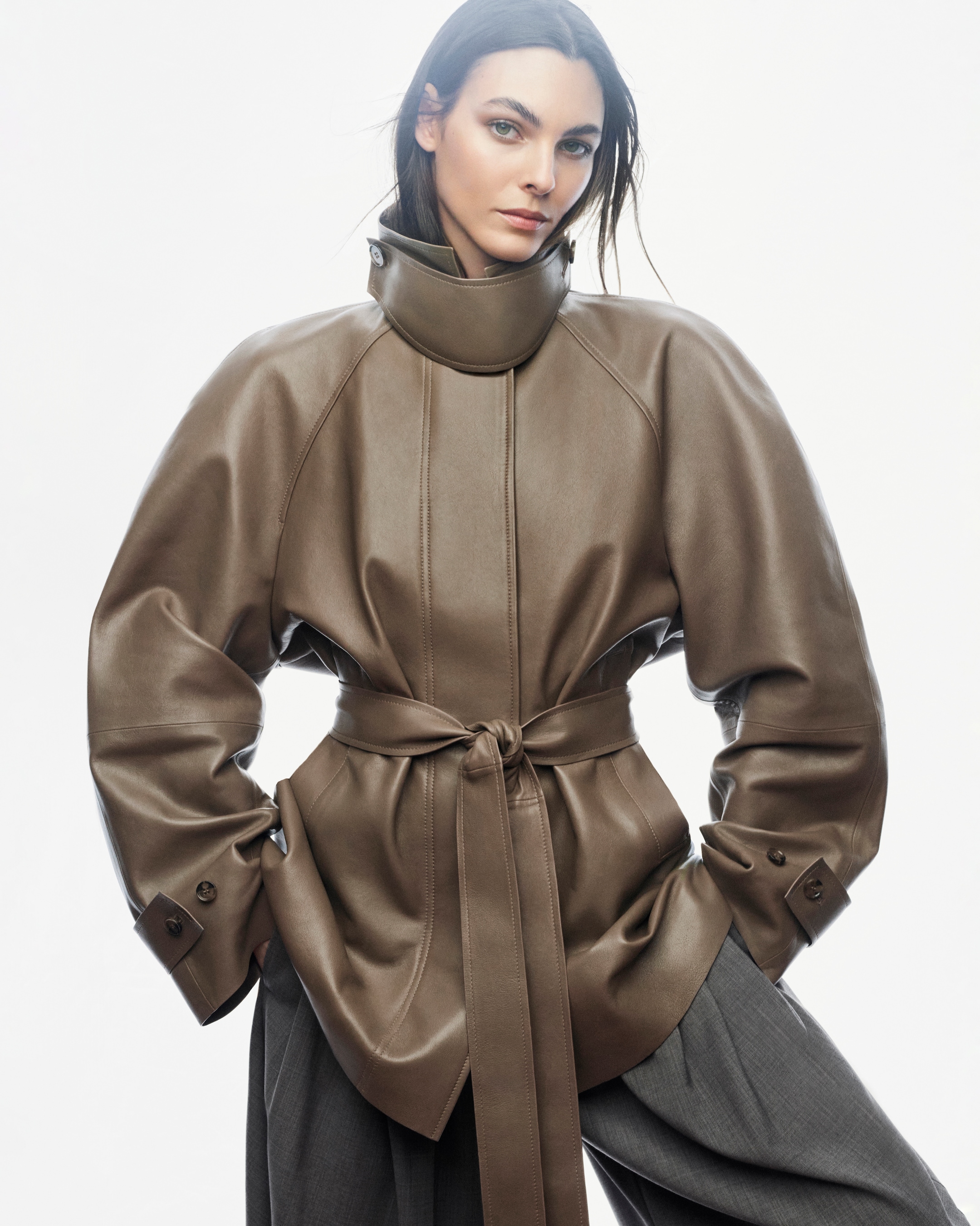 woman in khaki leather jacket