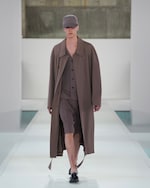 Placeholder for: brown waistcoat, shorts, cap and trench coat