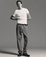 Placeholder for: man in white tshirt with jeans and belt