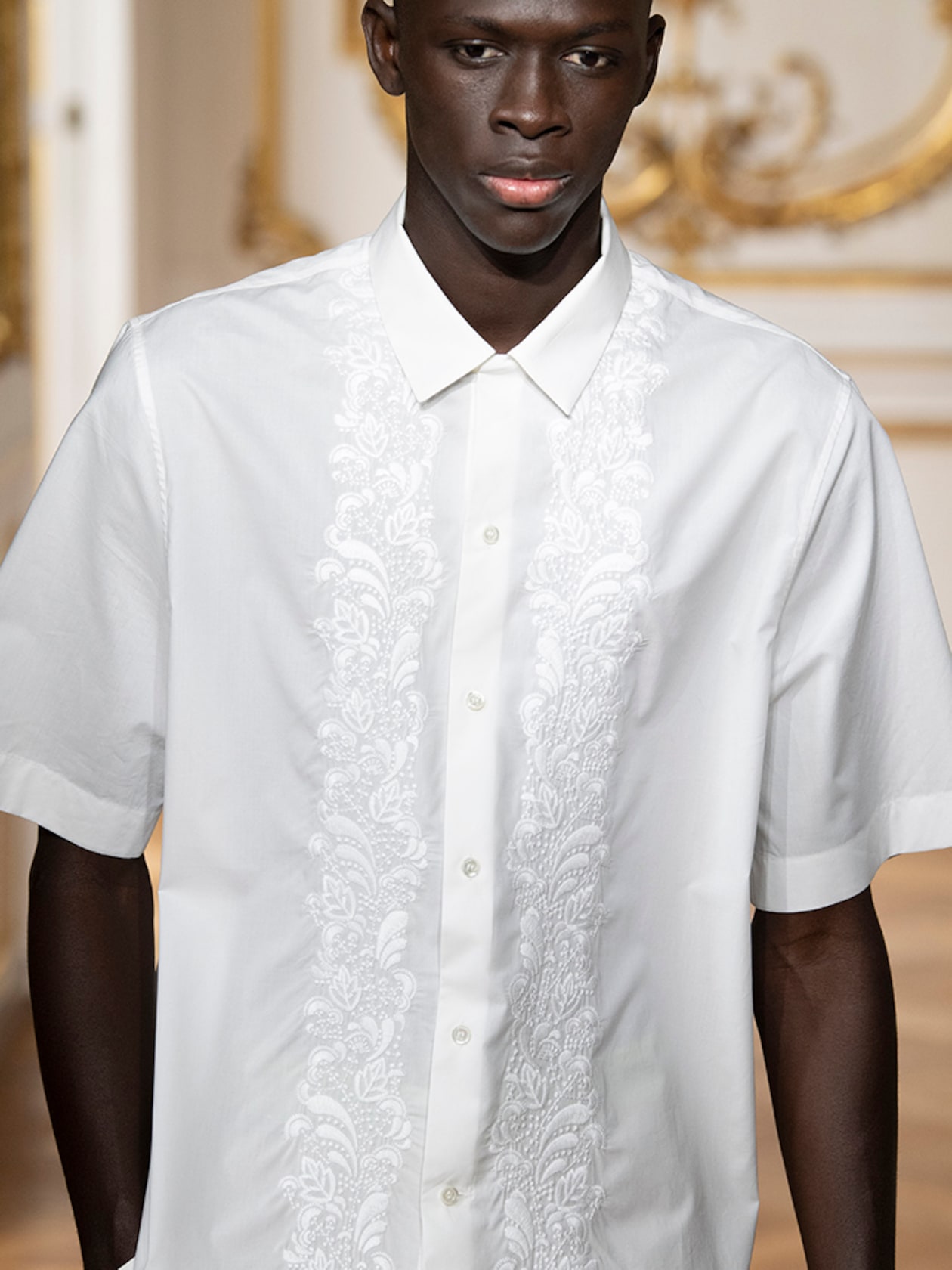 Person wearing white shirt