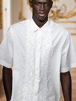 Placeholder for: Person wearing white shirt