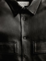 Placeholder for: Black leather collared shirt with chest pockets