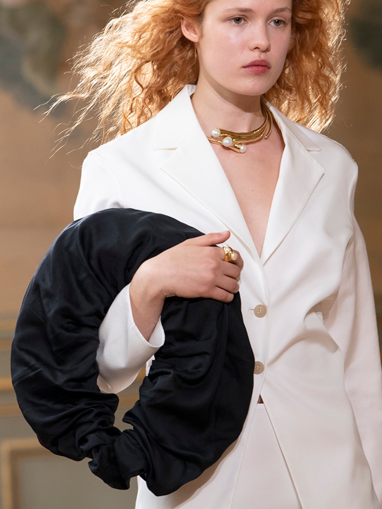 Person wearing suit and accessories