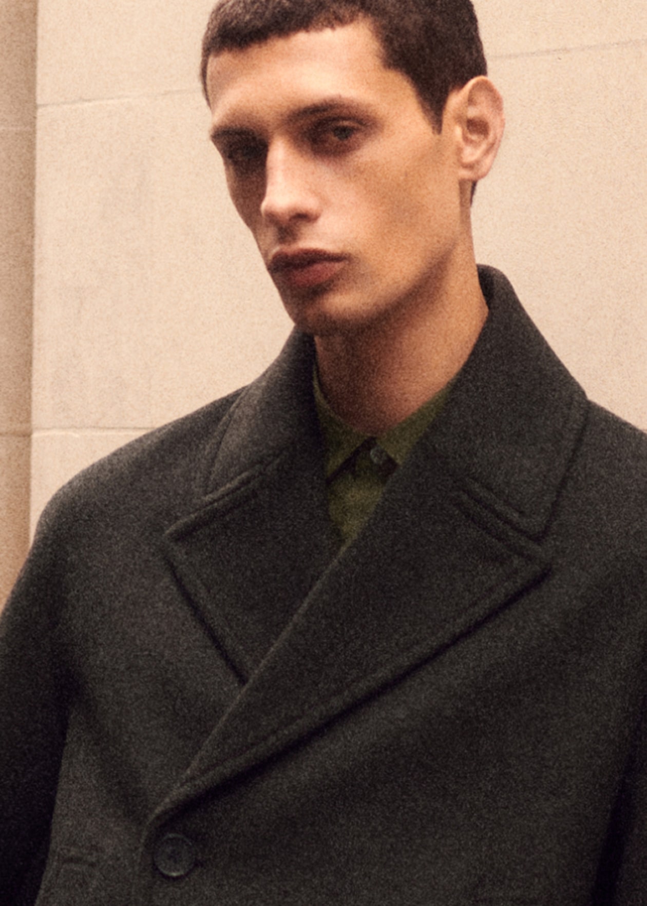 Person wearing brown coat