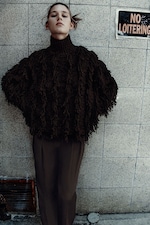 Placeholder for: Person wearing brown