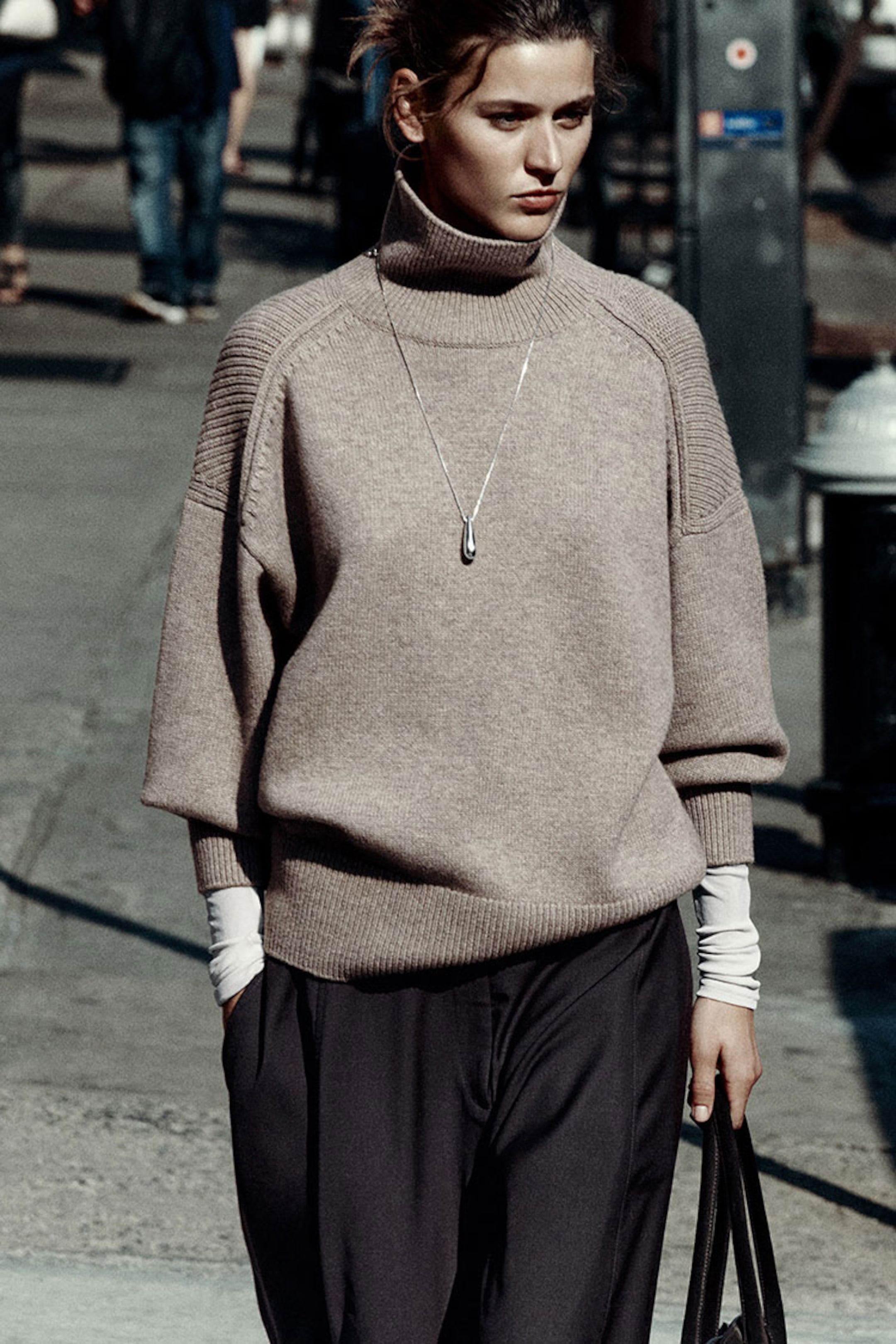 person wearing knitwear