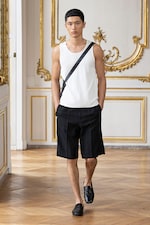 Placeholder for: Person wearing tops and shorts