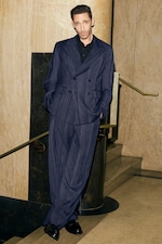 Placeholder for: Adrien wearing blue suit