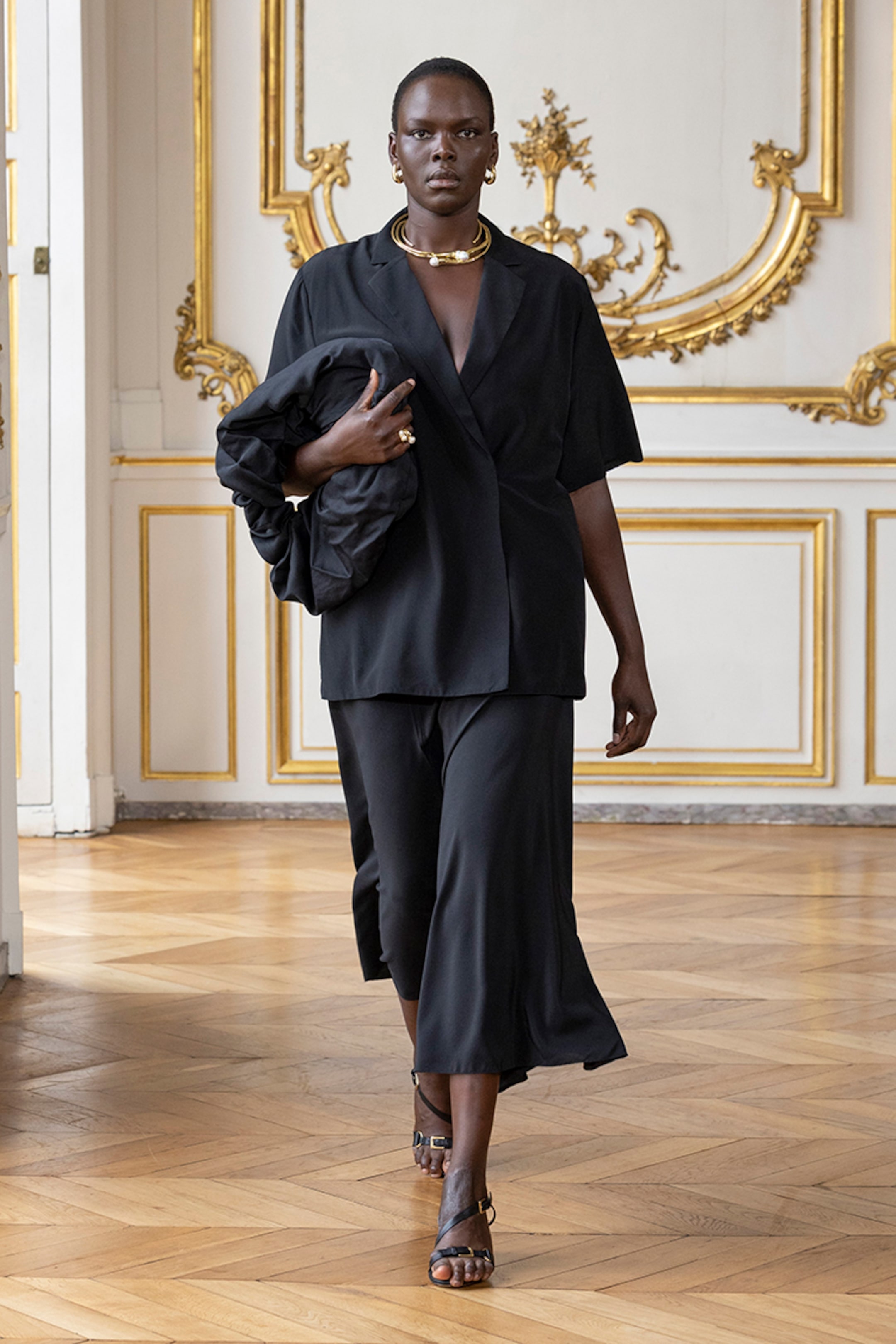 person wearing tops and trousers