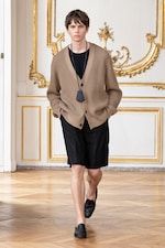 Placeholder for: Person wearing cardigan