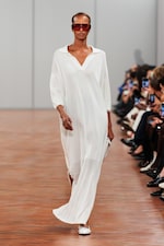 Placeholder for: Person wearing long white dress