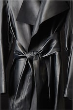 Placeholder for: leather coat detail