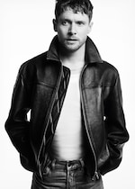 Placeholder for: Jack OConnel wearing white tshirt leather jacket