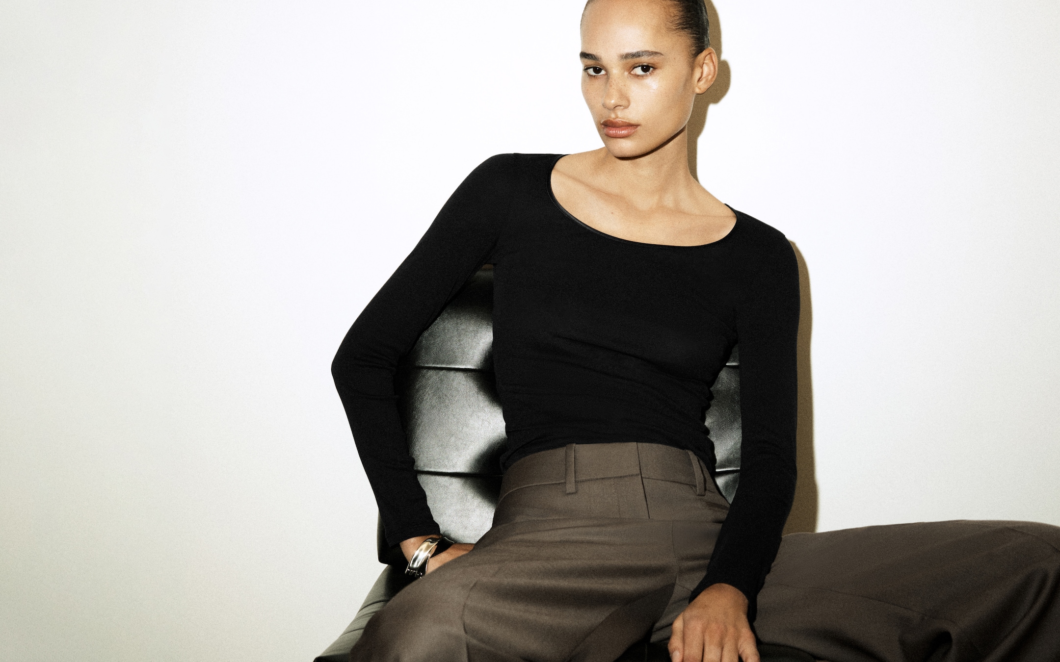 Woman in long sleeve top