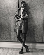 Placeholder for: woman in grey matching coat and skirt