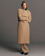 Placeholder for: Woman in trench coat