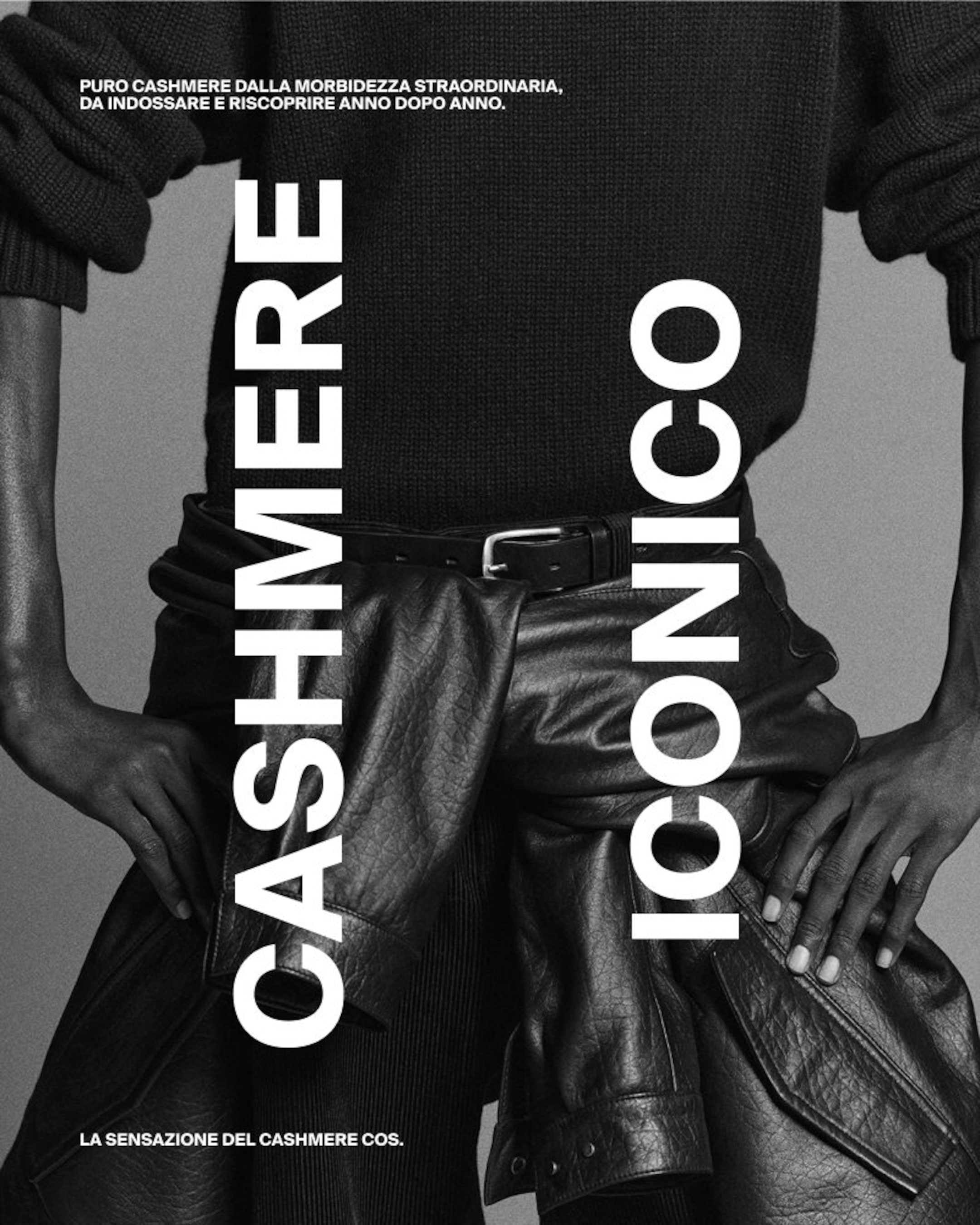 A black and white image of a person wearing a dark sweater and leather pants with the text "Cashmere Iconico" vertically displayed.