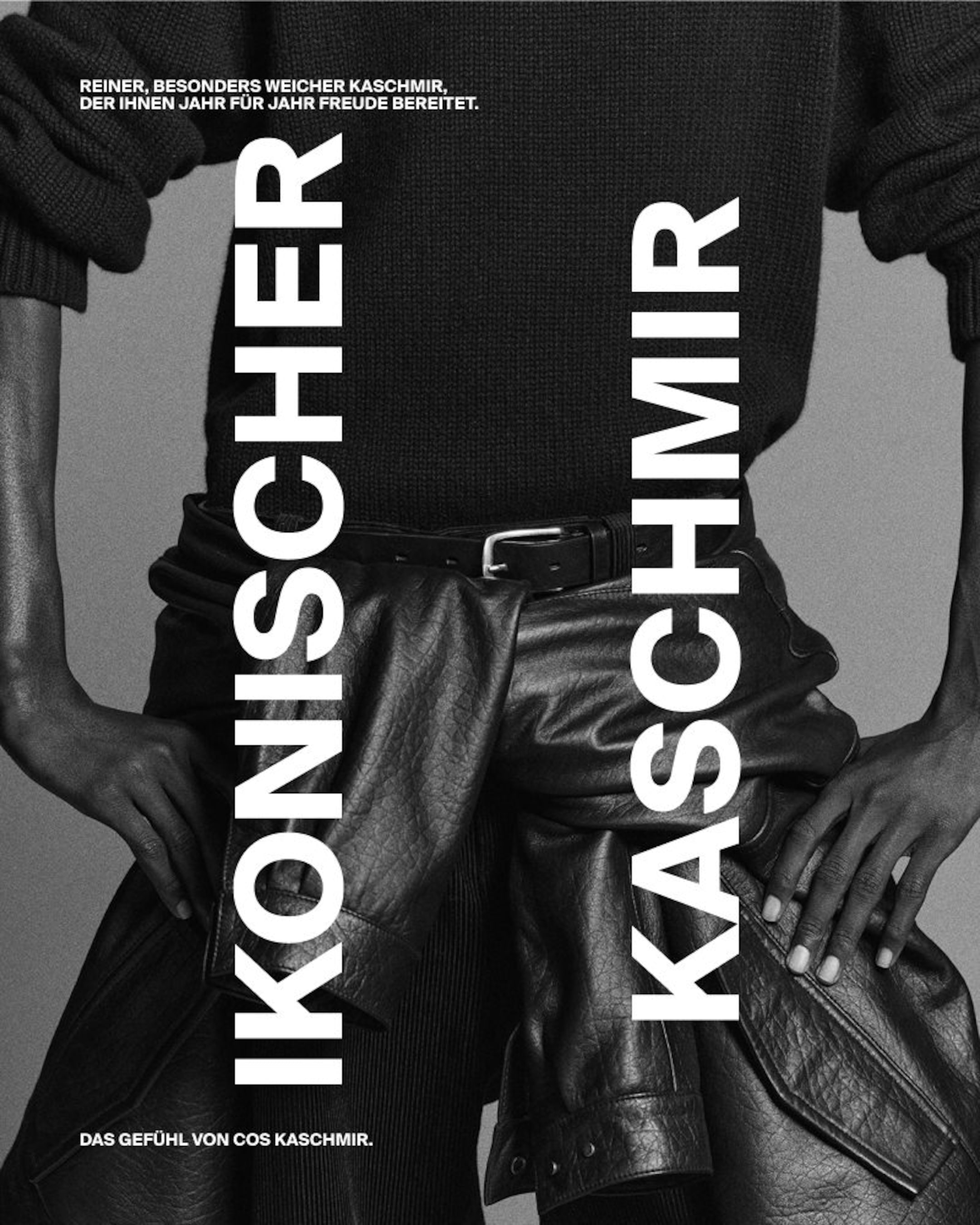 A person wearing a black knit sweater and leather pants. Overlay text in German promoting cashmere from COS.