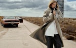 Placeholder for: Woman wearing grey wool coat walking away from car