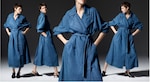 Placeholder for: Woman in long blue denim coat
